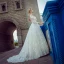Stunning Champagne Pierced Wedding Dresses 2017 Ball Gown Scoop Neck Long Sleeve Backless Appliques Lace Chapel Train
