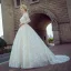Stunning Champagne Pierced Wedding Dresses 2017 Ball Gown Scoop Neck Long Sleeve Backless Appliques Lace Chapel Train