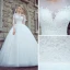 Chic / Beautiful White Pierced Wedding Dresses 2017 Ball Gown Scoop Neck Long Sleeve Appliques Lace Court Train