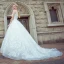 Elegant White Pierced Wedding Dresses 2017 Ball Gown Scoop Neck Sleeveless Backless Appliques Lace Court Train