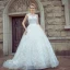 Elegant White Pierced Wedding Dresses 2017 Ball Gown Scoop Neck Sleeveless Backless Appliques Lace Court Train
