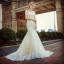 Sexy Champagne Pierced Wedding Dresses 2017 Trumpet / Mermaid Appliques Lace Scoop Neck Sleeveless Court Train