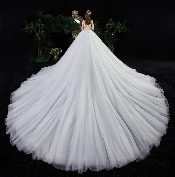 Charmant Ivoire Robe De Mariée 2020 Princesse Encolure Dégagée Perlage Perle Paillettes En Dentelle Fleur Manches Longues Cathedral Train