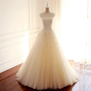 Vintage Originale Champagne Transparentes Robe De Mariée 2018 Princesse Perlage Encolure Dégagée Mancherons Dos Nu Appliques En Dentelle Train De Balayage Volants