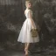 Modern / Fashion Champagne Prom Dresses 2018 A-Line / Princess Scoop Neck Sleeveless Embroidered Spotted Tulle Tea-length Ruffle Backless Formal Dresses