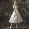 Modern / Fashion Champagne Prom Dresses 2018 A-Line / Princess Scoop Neck Sleeveless Embroidered Spotted Tulle Tea-length Ruffle Backless Formal Dresses