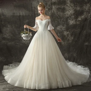 Fine Champagne Brudekjoler 2018 Ballkjole Av Skulderen 1 2 Ermer Ryggløse Appliques Blonder Glitter Paljetter Cathedral Train Buste