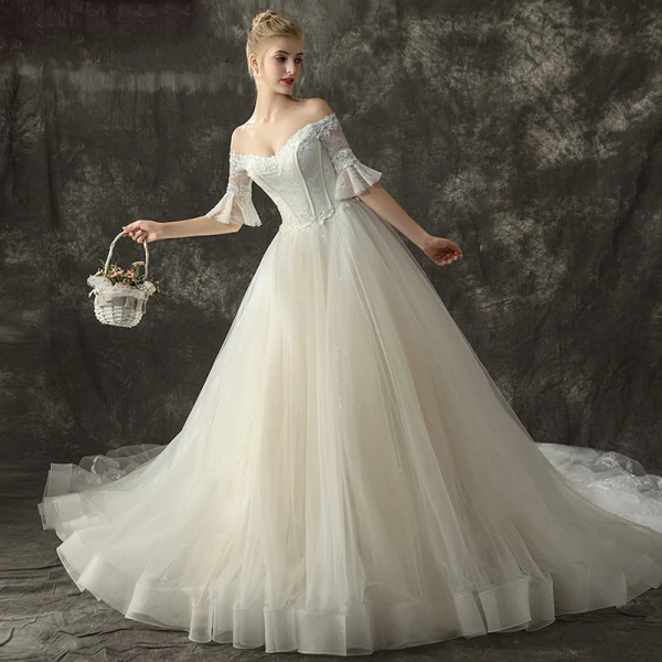 Schöne Champagner Brautkleider / Hochzeitskleider 2018 Ballkleid Off Shoulder 1/2 Ärmel Rückenfreies Applikationen Spitze Glanz Pailletten Kathedrale Schleppe Rüschen