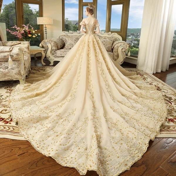 Luxury / Gorgeous Champagne Wedding Dresses 2018 Ball Gown Spaghetti Straps Puffy Short Sleeve Backless Appliques Lace Beading Pearl Cathedral Train Ruffle