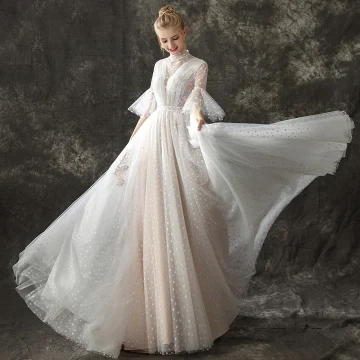 Vintage Retro Champagne See Through Wedding Dresses 2018 A Line Princess High Neck Bell Sleeves Spotted Tulle Sweep Train Ruffle