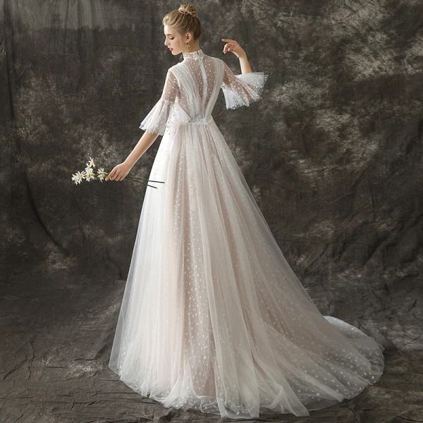 Vintage / Retro Champagne See-through Wedding Dresses 2018 A-Line / Princess High Neck Bell sleeves Spotted Tulle Sweep Train Ruffle