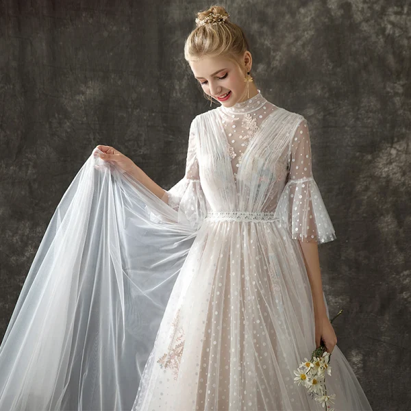 Vintage / Retro Champagne See-through Wedding Dresses 2018 A-Line / Princess High Neck Bell sleeves Spotted Tulle Sweep Train Ruffle