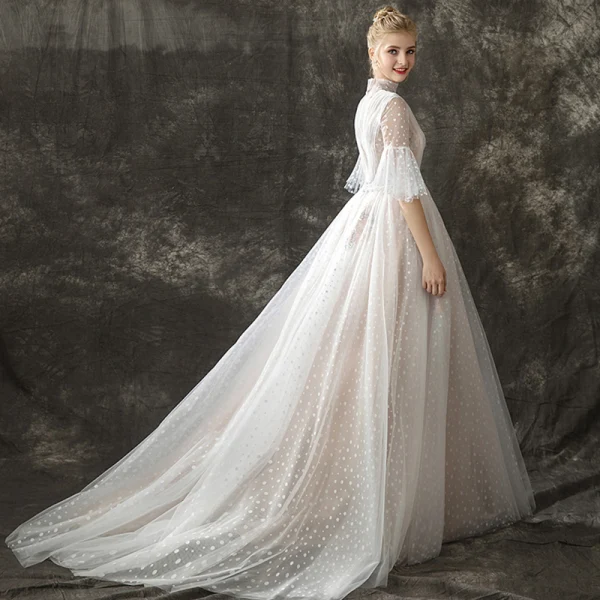 Vintage / Retro Champagne See-through Wedding Dresses 2018 A-Line / Princess High Neck Bell sleeves Spotted Tulle Sweep Train Ruffle