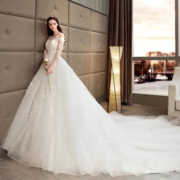 Chic / Belle Ivoire Robe De Mariée 2018 Princesse Transparentes Encolure Dégagée Manches Longues Dos Nu Appliques En Dentelle Perlage Perle Cathedral Train Volants