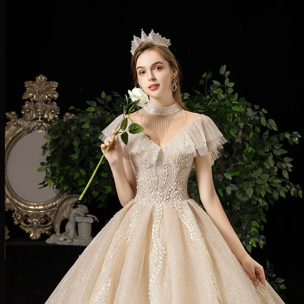 Meilleure Champagne Transparentes Robe De Mariée 2020 Princesse Col Haut Manches Courtes Dos Nu Glitter Tulle Appliques En Dentelle Perlage Royal Train Volants