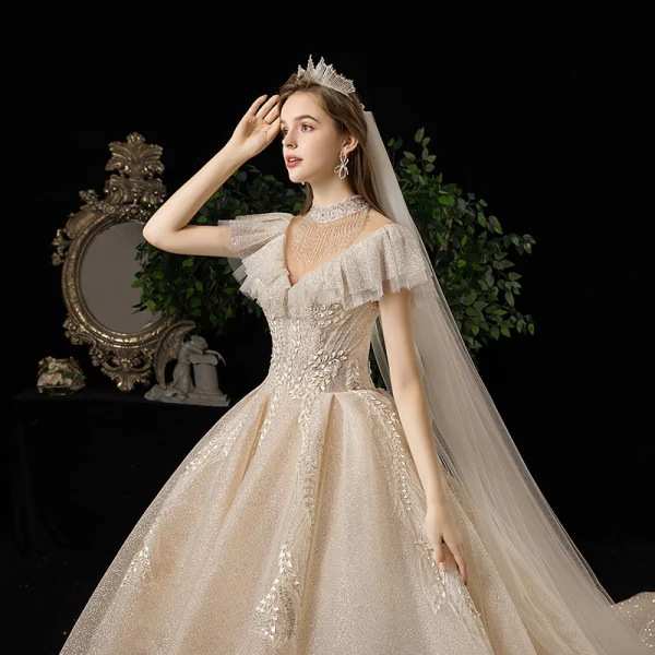 Meilleure Champagne Transparentes Robe De Mariée 2020 Princesse Col Haut Manches Courtes Dos Nu Glitter Tulle Appliques En Dentelle Perlage Royal Train Volants