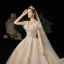 Meilleure Champagne Transparentes Robe De Mariée 2020 Princesse Col Haut Manches Courtes Dos Nu Glitter Tulle Appliques En Dentelle Perlage Royal Train Volants
