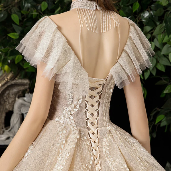 Meilleure Champagne Transparentes Robe De Mariée 2020 Princesse Col Haut Manches Courtes Dos Nu Glitter Tulle Appliques En Dentelle Perlage Royal Train Volants
