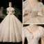 Meilleure Champagne Transparentes Robe De Mariée 2020 Princesse Col Haut Manches Courtes Dos Nu Glitter Tulle Appliques En Dentelle Perlage Royal Train Volants