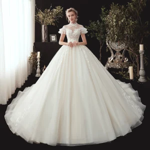 Vintage Retro Ivory See Through Wedding Dresses 2020 Ball Gown High Neck Short Sleeve Backless Appliques Lace Beading Chapel Train Ruffle