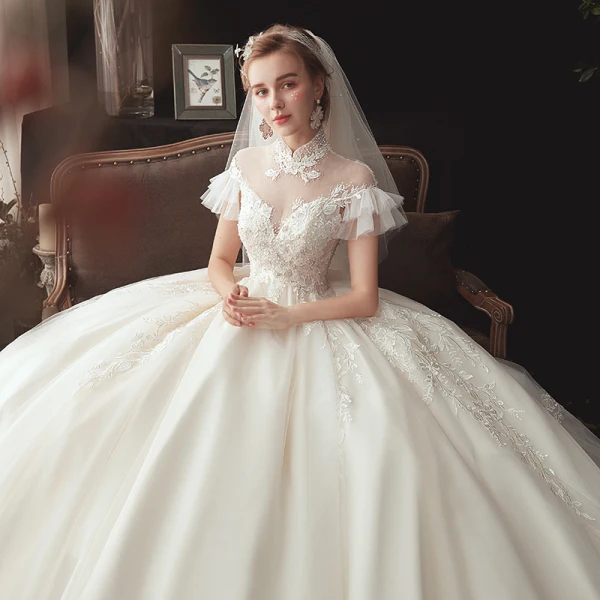 Vintage / Retro Ivory See-through Wedding Dresses 2020 Ball Gown High Neck Short Sleeve Backless Appliques Lace Beading Chapel Train Ruffle