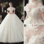 Vintage / Retro Ivory See-through Wedding Dresses 2020 Ball Gown High Neck Short Sleeve Backless Appliques Lace Beading Chapel Train Ruffle