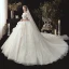 Romantique Ivoire Transparentes Robe De Mariée 2020 Robe Boule Encolure Dégagée 1/2 Manches Dos Nu Glitter Tulle Étoile Appliques En Dentelle Chapel Train Volants