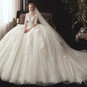 Romantic Ivory See Through Wedding Dresses 2020 Ball Gown Scoop Neck 1 2 Sleeves Backless Glitter Tulle Star Appliques Lace Chapel Train Ruffle