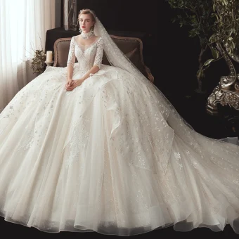 Romantique Ivoire Transparentes Robe De Mariée 2020 Robe Boule Encolure Dégagée 1 2 Manches Dos Nu Glitter Tulle Étoile Appliques En Dentelle Chapel Train Volants