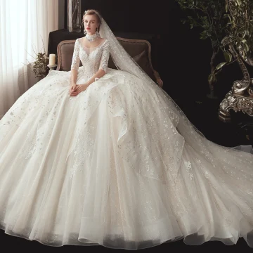 Romantic Ivory See Through Wedding Dresses 2020 Ball Gown Scoop Neck 1 2 Sleeves Backless Glitter Tulle Star Appliques Lace Chapel Train Ruffle