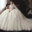 Romantique Ivoire Transparentes Robe De Mariée 2020 Robe Boule Encolure Dégagée 1/2 Manches Dos Nu Glitter Tulle Étoile Appliques En Dentelle Chapel Train Volants