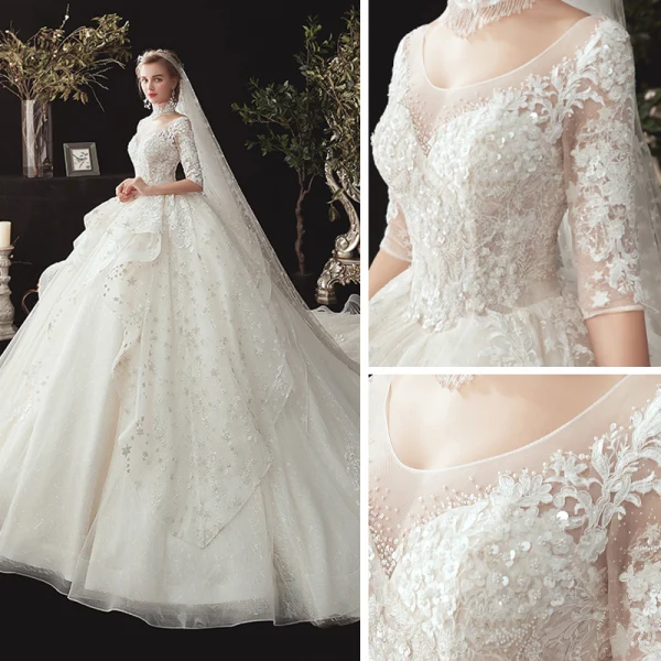 Romantique Ivoire Transparentes Robe De Mariée 2020 Robe Boule Encolure Dégagée 1/2 Manches Dos Nu Glitter Tulle Étoile Appliques En Dentelle Chapel Train Volants