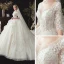 Romantique Ivoire Transparentes Robe De Mariée 2020 Robe Boule Encolure Dégagée 1/2 Manches Dos Nu Glitter Tulle Étoile Appliques En Dentelle Chapel Train Volants