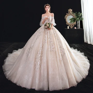 Élégant Champagne Robe De Mariée 2020 Robe Boule De L 039 Épaule Gonflée Manches Courtes Dos Nu Appliques En Dentelle Perlage Cathedral Train Volants