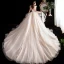 Chic / Belle Transparentes Champagne Robe De Mariée 2020 Robe Boule Col Haut Sans Manches Dos Nu Appliques En Dentelle Perlage Cathedral Train Volants