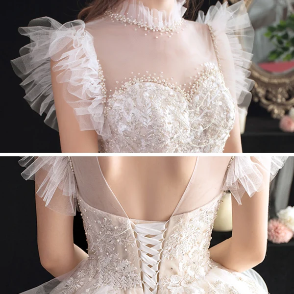 Chic / Belle Transparentes Champagne Robe De Mariée 2020 Robe Boule Col Haut Sans Manches Dos Nu Appliques En Dentelle Perlage Cathedral Train Volants