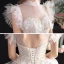 Chic / Belle Transparentes Champagne Robe De Mariée 2020 Robe Boule Col Haut Sans Manches Dos Nu Appliques En Dentelle Perlage Cathedral Train Volants