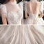 Chic / Belle Transparentes Champagne Robe De Mariée 2020 Robe Boule Col Haut Sans Manches Dos Nu Appliques En Dentelle Perlage Cathedral Train Volants