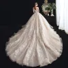 Chic / Beautiful Champagne See-through Wedding Dresses 2020 Ball Gown Off-The-Shoulder Short Sleeve Backless Beading Tassel Appliques Lace Cathedral Train Ruffle