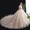 Chic / Beautiful Champagne See-through Wedding Dresses 2020 Ball Gown Off-The-Shoulder Short Sleeve Backless Beading Tassel Appliques Lace Cathedral Train Ruffle