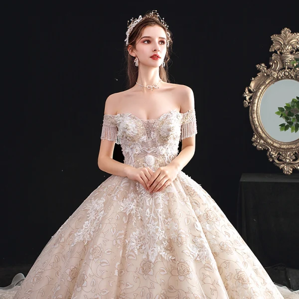 Schöne Champagner Durchsichtige Brautkleider / Hochzeitskleider 2020 Ballkleid Off Shoulder Kurze Ärmel Rückenfreies Perlenstickerei Quaste Applikationen Spitze Kathedrale Schleppe Rüschen