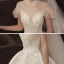 Haut de Gamme Champagne Transparentes Robe De Mariée 2020 Robe Boule Col Haut Manches Courtes Dos Nu Fait main Perlage Glitter Tulle Royal Train