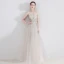 Charmant Champagne Robe De Soirée 2020 Princesse Bretelles Spaghetti Sans Manches Tachetée Tulle Appliques En Dentelle Perlage Longue Volants Dos Nu Robe De Ceremonie
