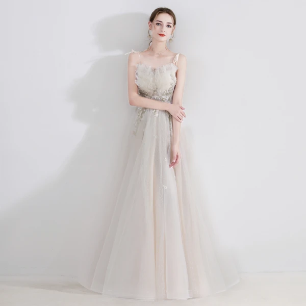 Charmant Champagne Robe De Soirée 2020 Princesse Bretelles Spaghetti Sans Manches Tachetée Tulle Appliques En Dentelle Perlage Longue Volants Dos Nu Robe De Ceremonie