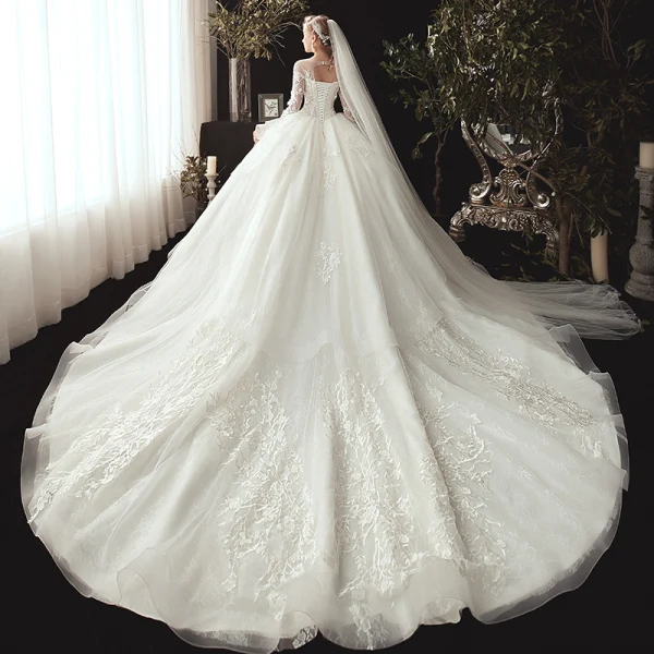 Chic / Belle Ivoire Transparentes Robe De Mariée 2020 Robe Boule Encolure Dégagée 3/4 Manches Appliques En Dentelle Perle Chapel Train Volants Dos Nu