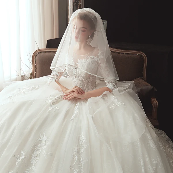 Chic / Belle Ivoire Transparentes Robe De Mariée 2020 Robe Boule Encolure Dégagée 3/4 Manches Appliques En Dentelle Perle Chapel Train Volants Dos Nu