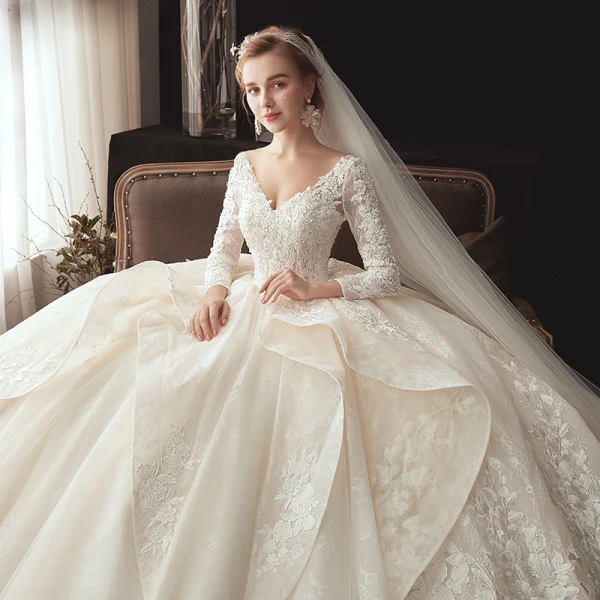 Best Champagne Wedding Dresses 2020 Ball Gown V-Neck 3/4 Sleeve Backless Appliques Lace Beading Pearl Chapel Train Ruffle