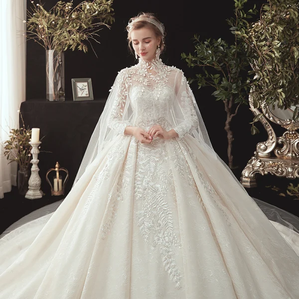 Conte de fée Champagne Transparentes Robe De Mariée Avec Cape 2020 Robe Boule Col Haut 3/4 Manches Dos Nu Appliques En Dentelle Perlage Watteau Train Volants