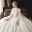 Conte de fée Champagne Transparentes Robe De Mariée Avec Cape 2020 Robe Boule Col Haut 3/4 Manches Dos Nu Appliques En Dentelle Perlage Watteau Train Volants