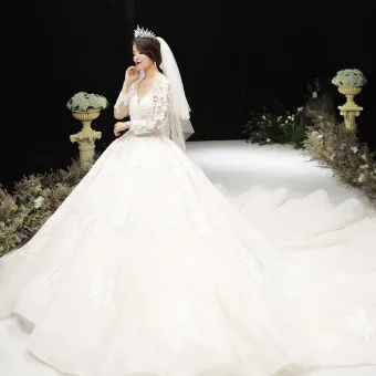 Luxury Gorgeous Champagne See Through Wedding Dresses 2020 Ball Gown Scoop Neck Long Sleeve Pierced Appliques Lace Beading Royal Train Ruffle